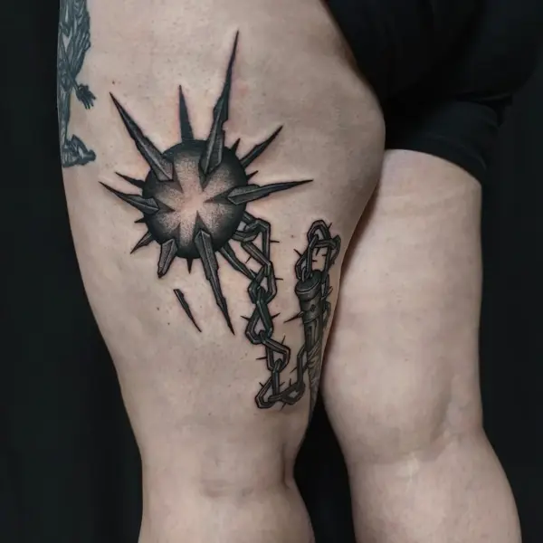 Blackwork spiked mace tattoo by @regna.sm_tattooer