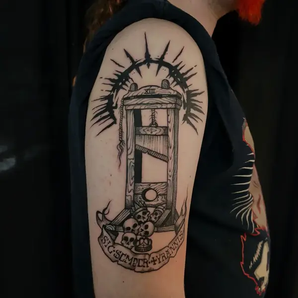 Blackwork guillotine tattoo by @regna.sm_tattooer