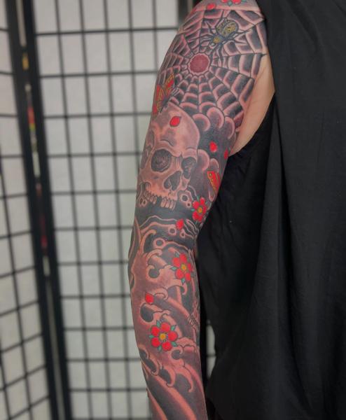 Japanese skull and flowers tattoo by @richpearson