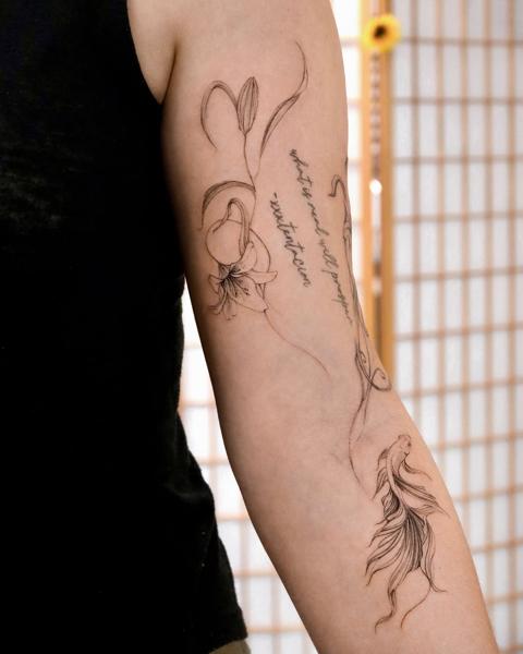 Fine line lily fish script tattoo by @tattooist_rimi