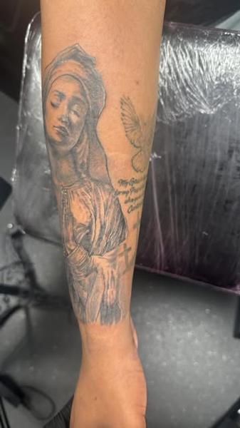 Realism religious figure tattoo by @noka.tattoo