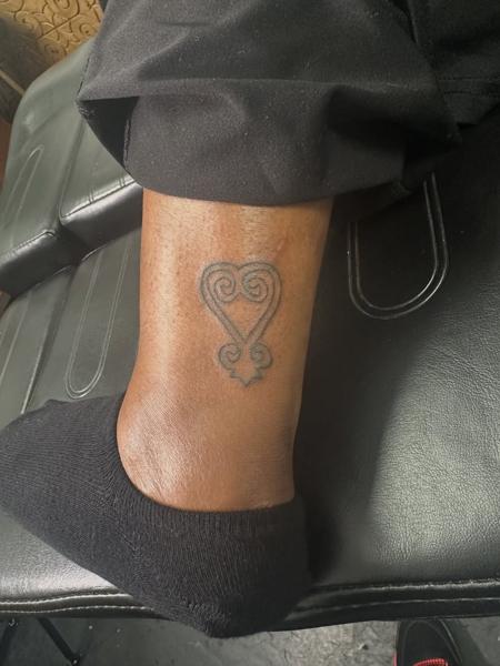 Fine line ornamental heart tattoo by @noka.tattoo