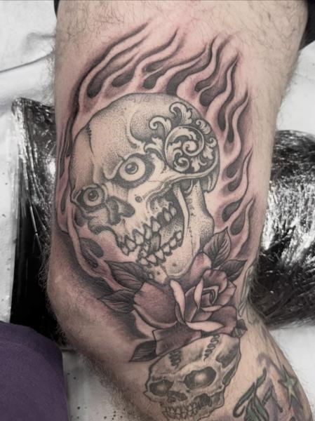 Blackwork flaming skull tattoo by @robertatkinson_tattoo