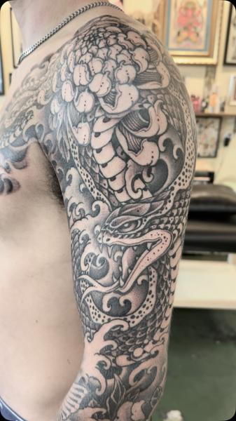Japanese dragon tattoo by @robertatkinson_tattoo