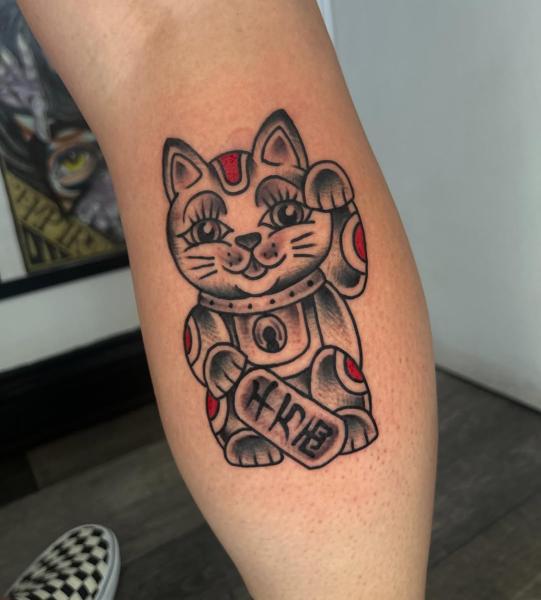 Traditional lucky cat tattoo by @robertcresswell28