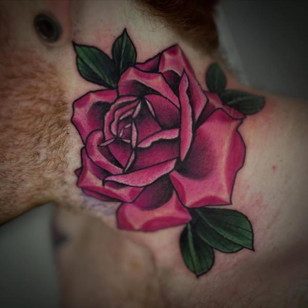 Traditional rose tattoo by @robertcresswell28