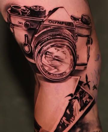 Realism vintage camera tattoo by @rubentattooer