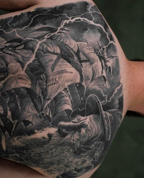 Realism stormy seascape tattoo by @rubentattooer