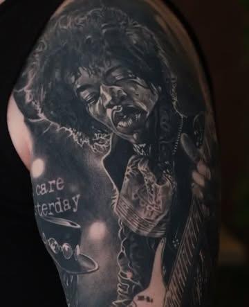 Realism jimi hendrix portrait tattoo by @rubentattooer
