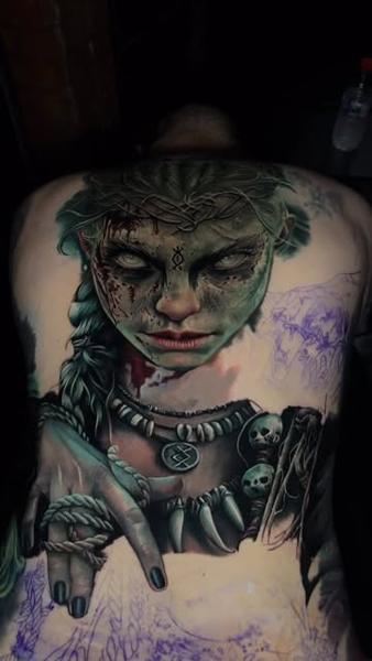 Realism warrior woman tattoo by @sambarbertattoo