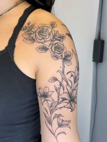 Fine line floral arrangement tattoo by @samclaridgetattoos