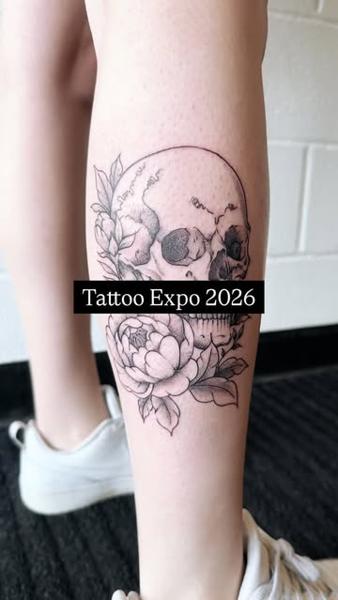 Fine line floral skull tattoo by @samclaridgetattoos