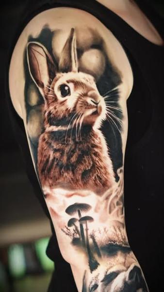 Realism realistic rabbit tattoo by @samjohns.tattoos