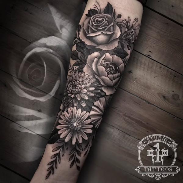Black and grey floral floral bouquet tattoo by @startattooist