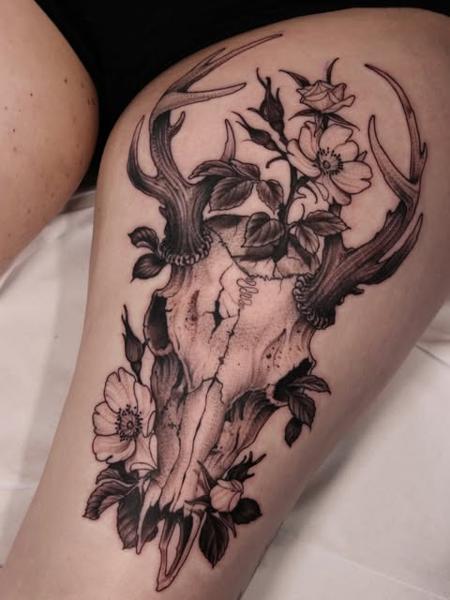 Blackwork floral deer skull tattoo by @sammylou_tattoo