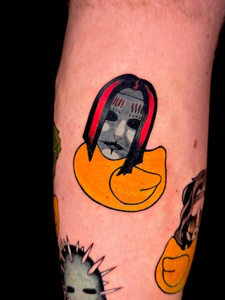 Illustrative rubber duck mask tattoo by @sandrosecchin