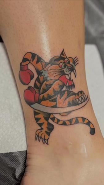 Traditional boxing tiger tattoo by @scott_weatherwax