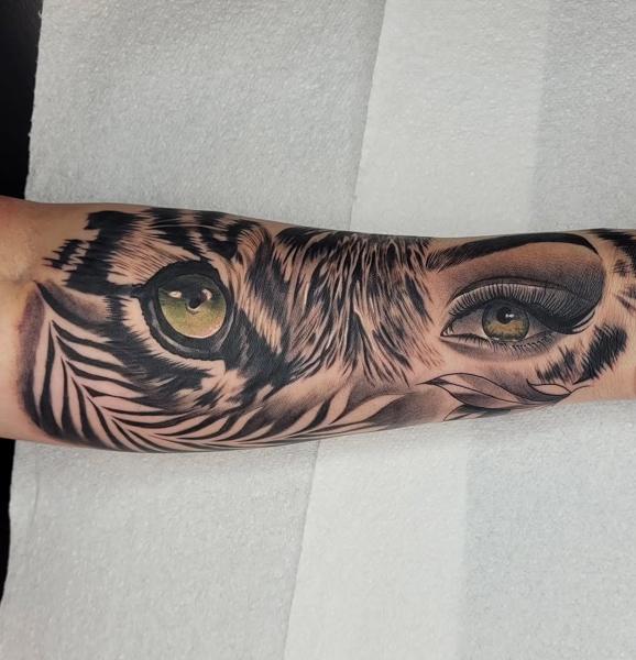 Realism tiger human eye tattoo by @sean.dwyer.tattoo