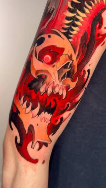 Neo-traditional flaming skull tattoo by @seannewmantattoo