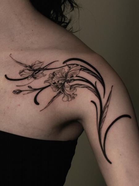 Fine line floral design tattoo by @sem_tattooer