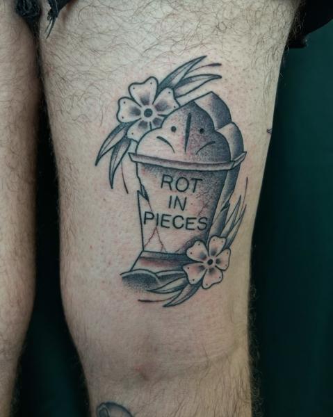 Traditional tombstone flowers tattoo by @seshi.ink