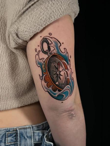 Traditional compass tattoo by @the_cutter_tattooer