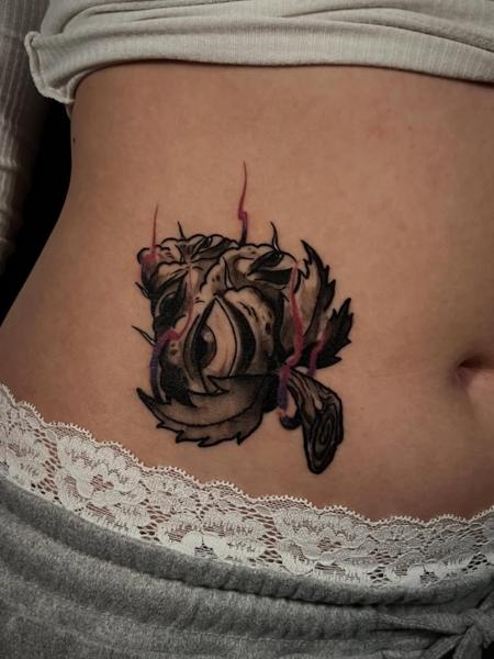 Illustrative abstract face tattoo by @the_cutter_tattooer