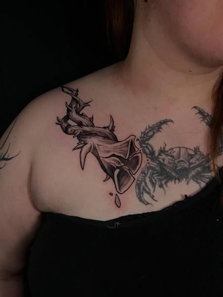 Illustrative wooden dagger tattoo by @the_cutter_tattooer