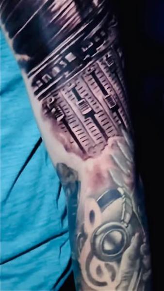 Realism audio mixer tattoo by @khantat2