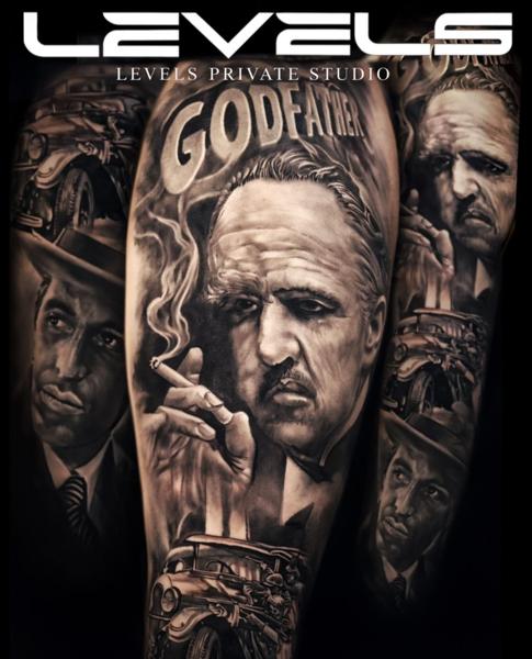 Realism godfather portrait tattoo by @khantat2