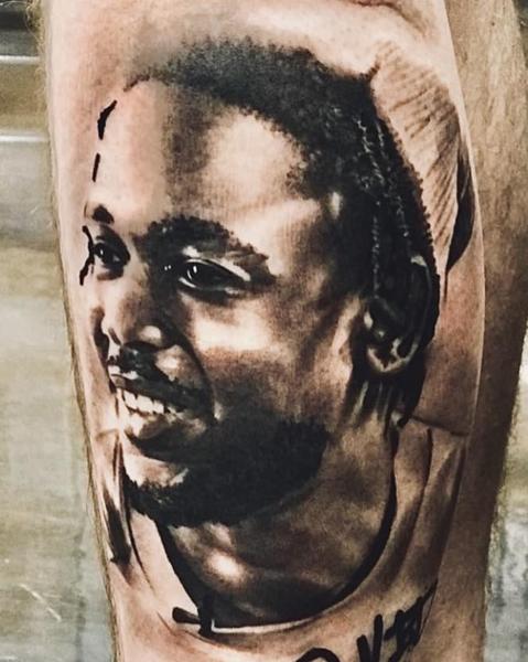 Realism kendrick lamar portrait tattoo by @khantat2