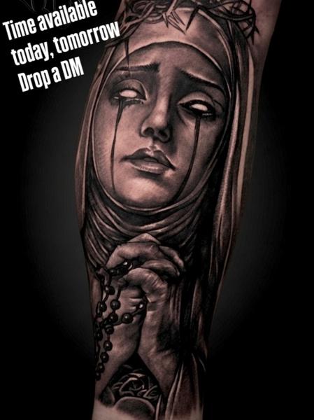 Realism crying nun tattoo by @khantat2