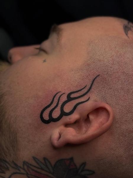 Blackwork stylized flames tattoo by @sharitattoos
