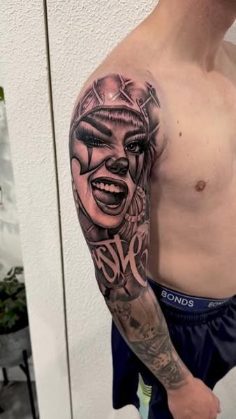 Chicano realism clown woman portrait tattoo by @shayne.r.tattoos
