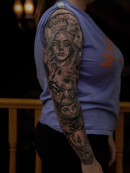 Realism alice in wonderland sleeve tattoo by @sherree_lionheart_tattoos