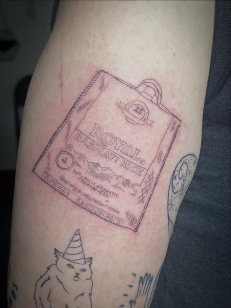 Fine Line rice bag tattoo by @sidryantattoo