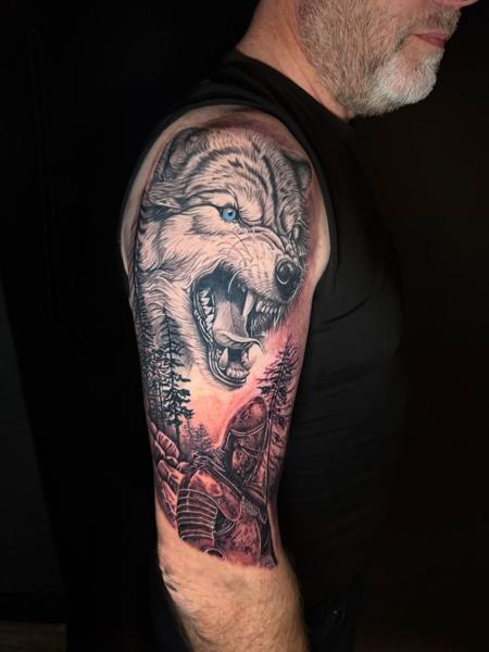 Realism wolf and knight tattoo by @inkedsiren_tattoo