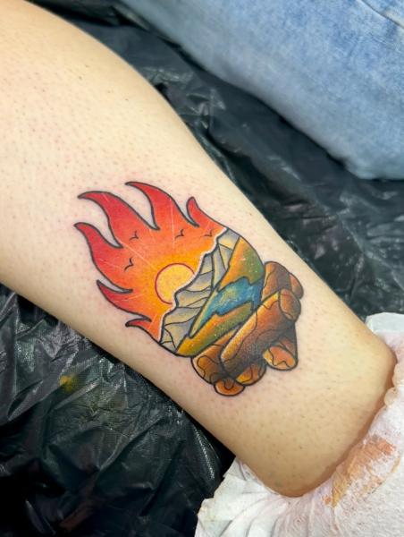 Traditional sunset landscape tattoo by @sjlant