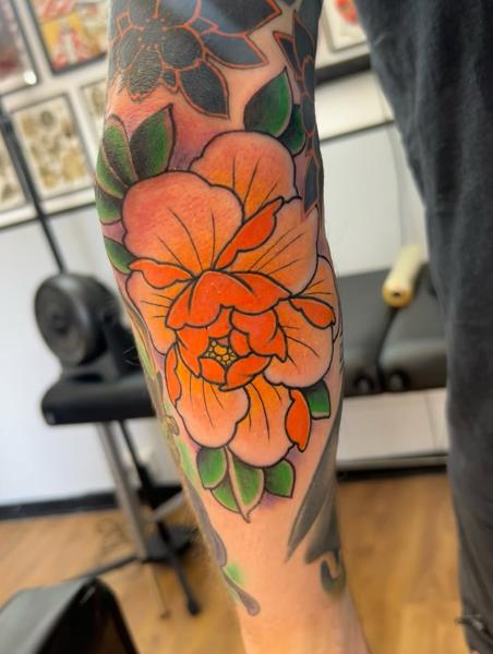 Traditional floral design tattoo by @sjlant