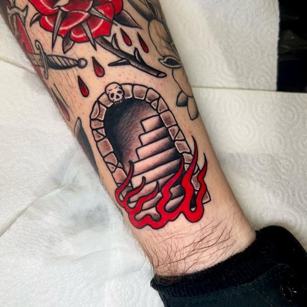 Traditional flaming staircase tattoo by @sjlant