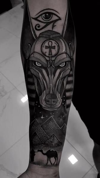 Illustrative blackwork egyptian anubis tattoo by @slimmoxmooreblackwork