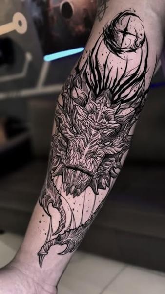 Illustrative blackwork dark creature head tattoo by @slimmoxmooreblackwork