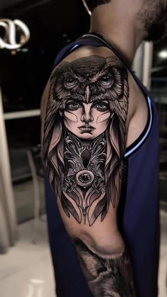 Realism owl woman tattoo by @slimmoxmooreblackwork
