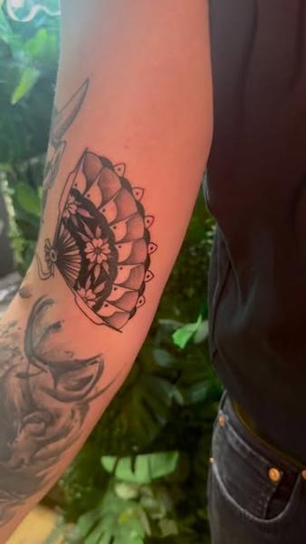 Blackwork floral fan tattoo by @snowy_tattoo