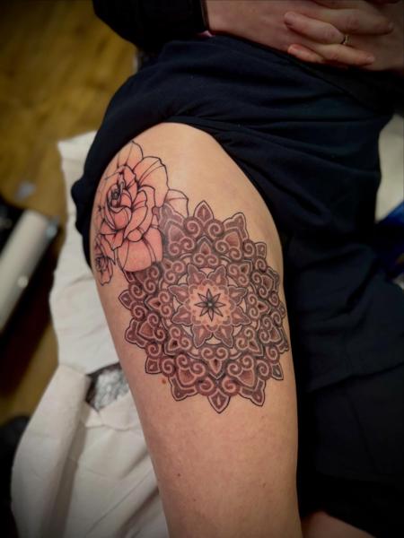 Ornamental mandala flower tattoo by @snowy_tattoo