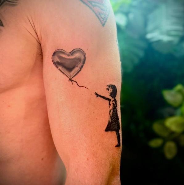 Blackwork girl with balloon tattoo by @snowy_tattoo