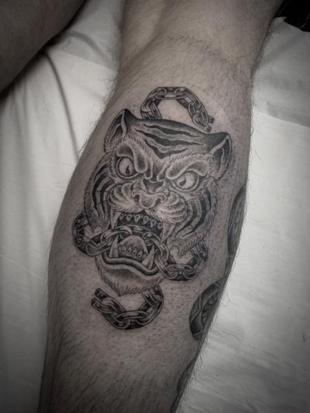 Traditional tiger head tattoo by @sonnyrohantattoo