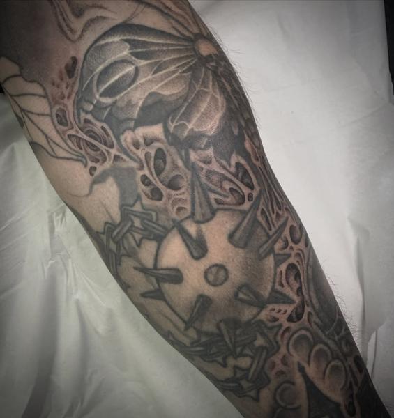 Blackwork spiked mace tattoo by @sonnyrohantattoo