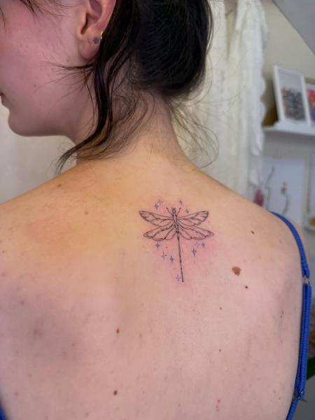 Fine line dragonfly tattoo by @soso_tattoo.hk