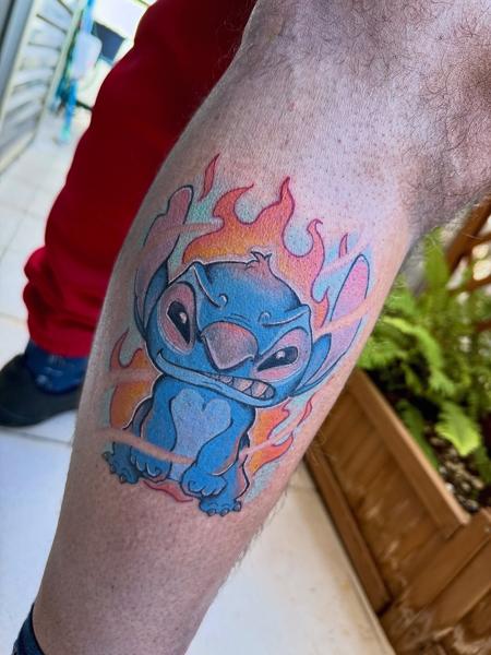 Illustrative flaming stitch tattoo by @delavina.ttt